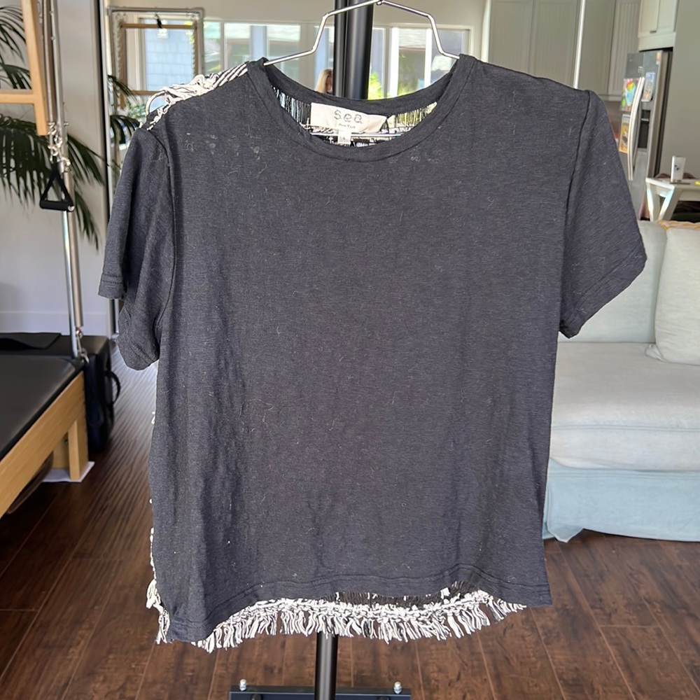 SEA size Small tshirt with woven black and white detail across entire back.